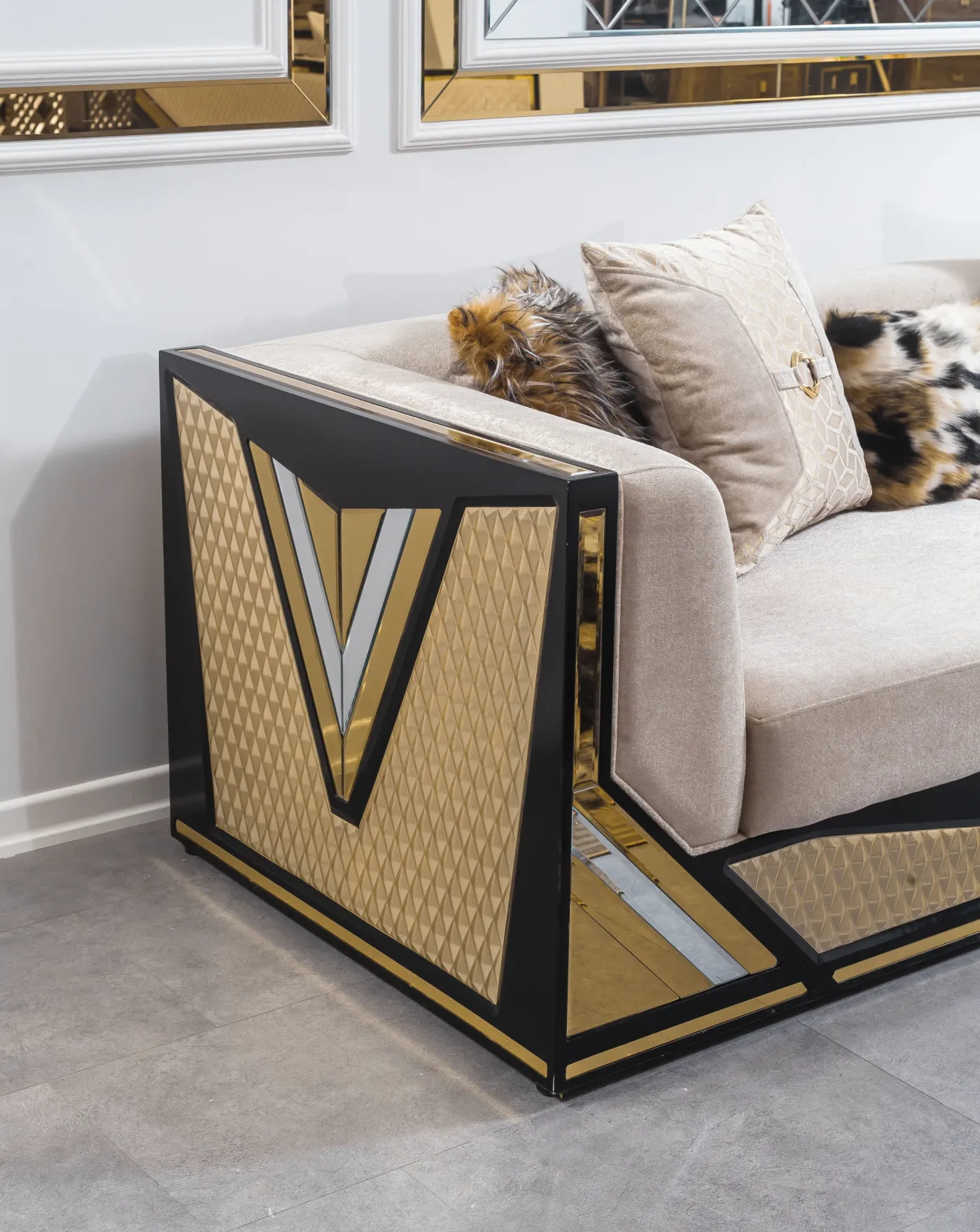 Close-up of the signature V-pattern gold inlay on an Angel Pro frame