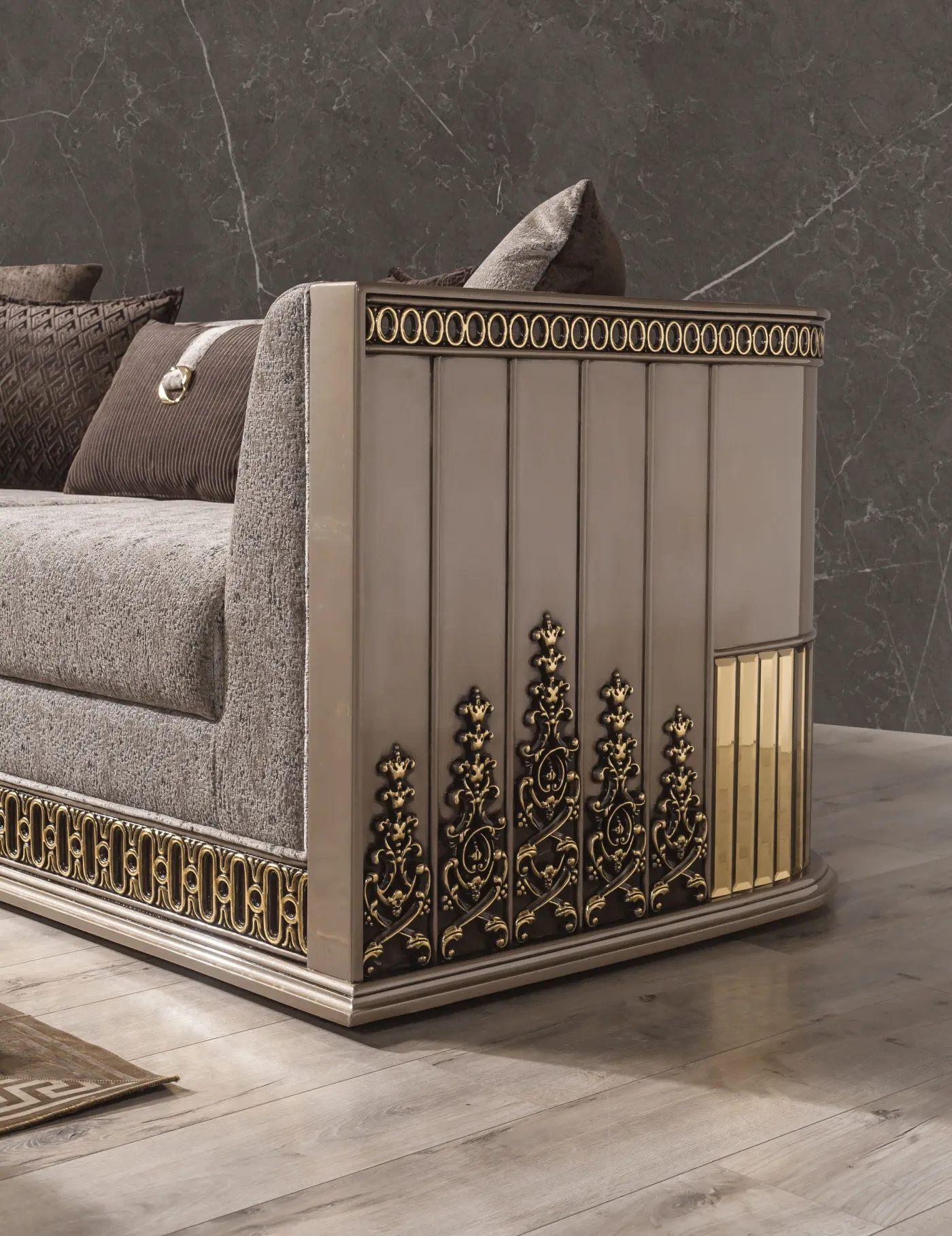 Gucci sofa side panel showing the vertical gold fluting