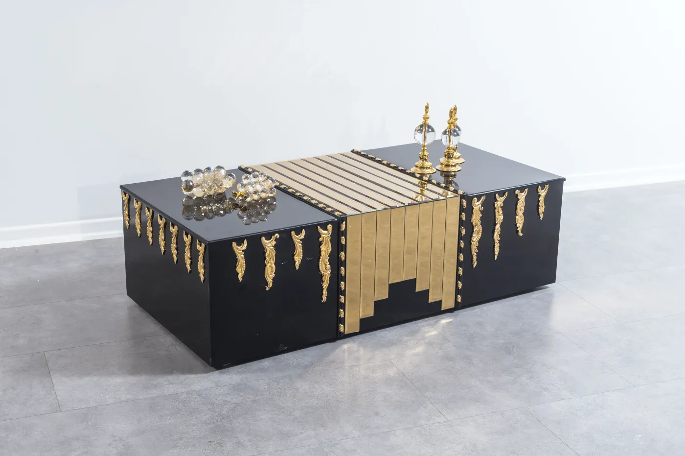 Lagos coffee table in black lacquer with gold tassel panels